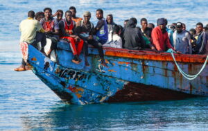 Migrants disembark in the port of Arguineguin