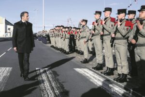 Le president francais, Emmanuel Macron durant la revue de troupes des armees sur la base marine de Cherbourg